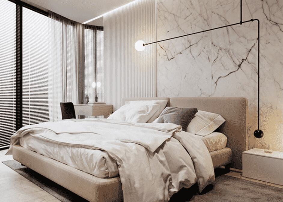 cosmopolitan-bedroom-interior-design-with-a-bed-and-pillows
