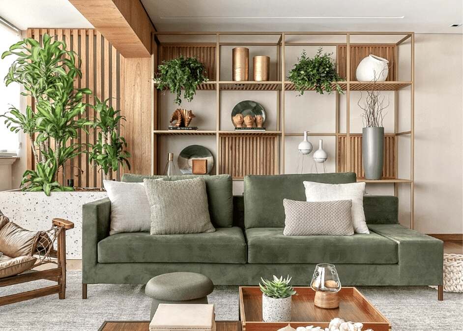 a-cosy-living-room-with-a-green-couch-and-shelves