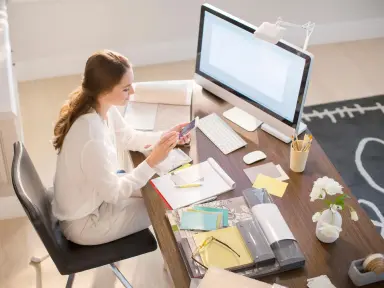 a-women-working-on-a-desktop